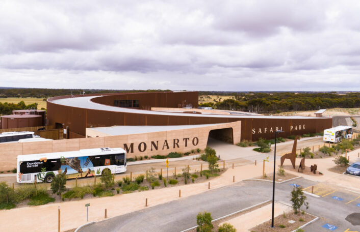 A drone photo of Monarto Safari Park Visitor Centre with bus at the front